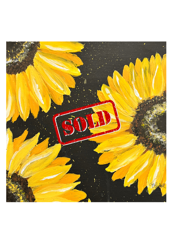 Sunflower wall art with red 'SEED' stamp over yellow blooms on dark background.