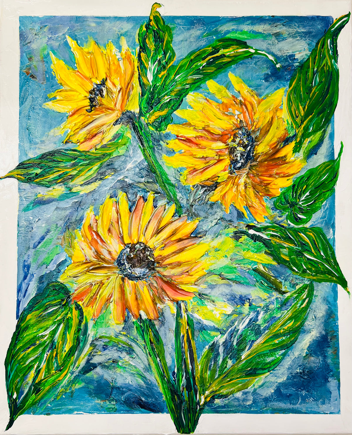 Framed sunflower landscape painting with three bright yellow blooms and green leaves on blue.
