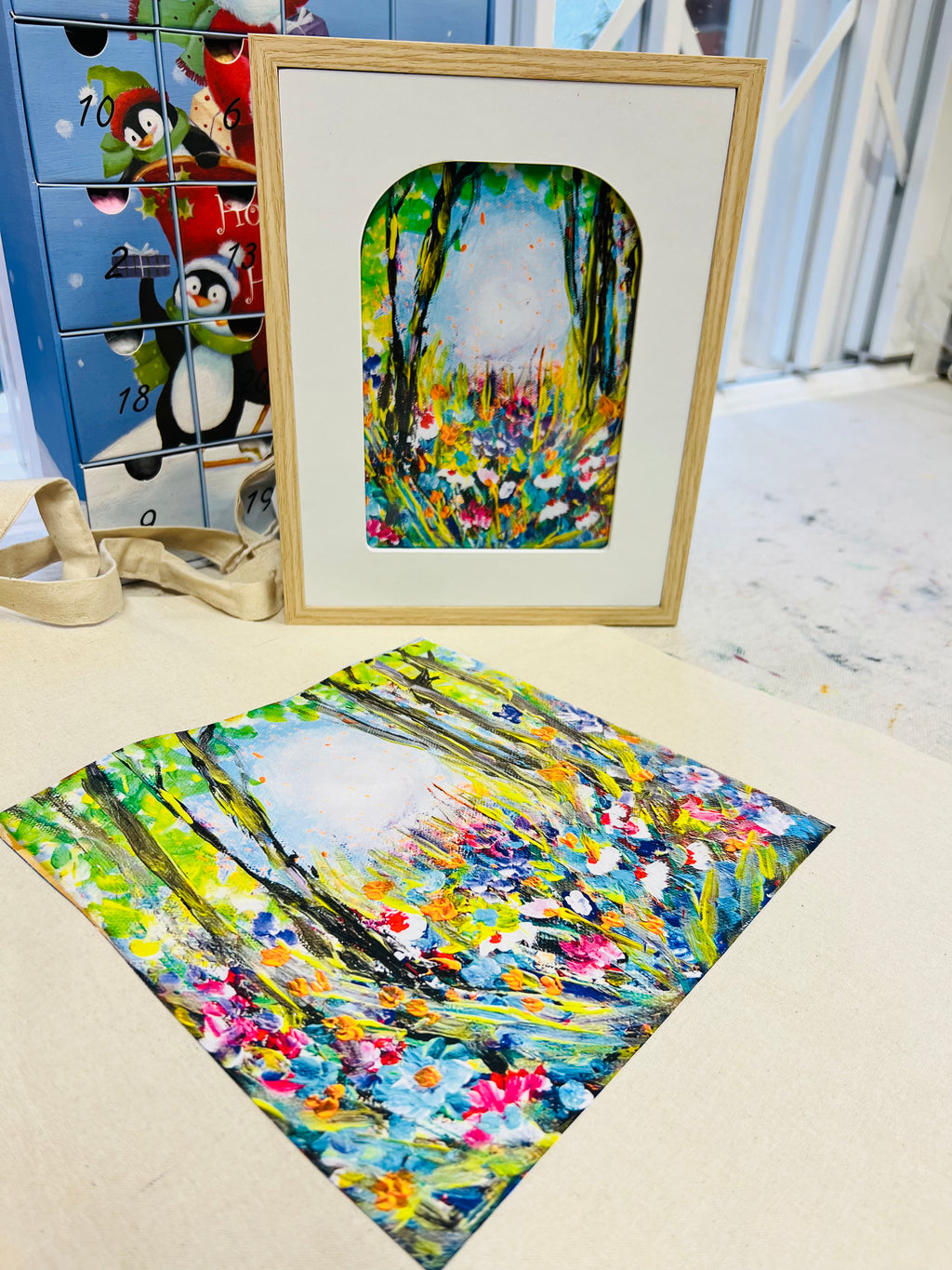 Symphony of Flowers gift set featuring a framed 13x18cm floral art print and a matching cotton canvas tote bag.