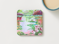 Set of four 9.5cm impressionist garden art coasters with lily pond and floral design