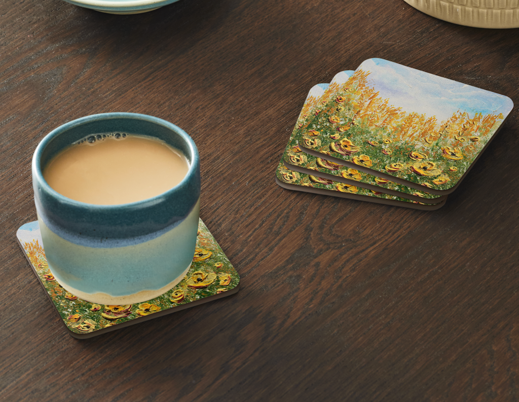 Single 9.5cm art coaster featuring a painted golden poppy field with amber grasses and a soft blue sky set of 4