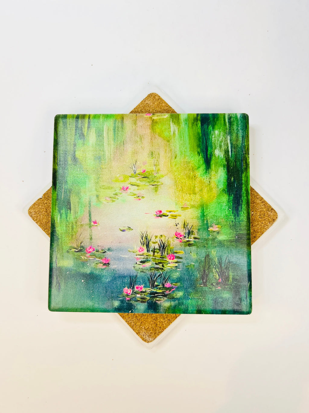 Square ceramic coaster with green water-lily pond illustration and pink blossoms