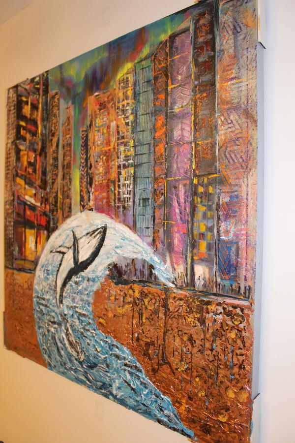 Abstract wall art painting viewed at angle with dolphin silhouette and vivid multicolor panels