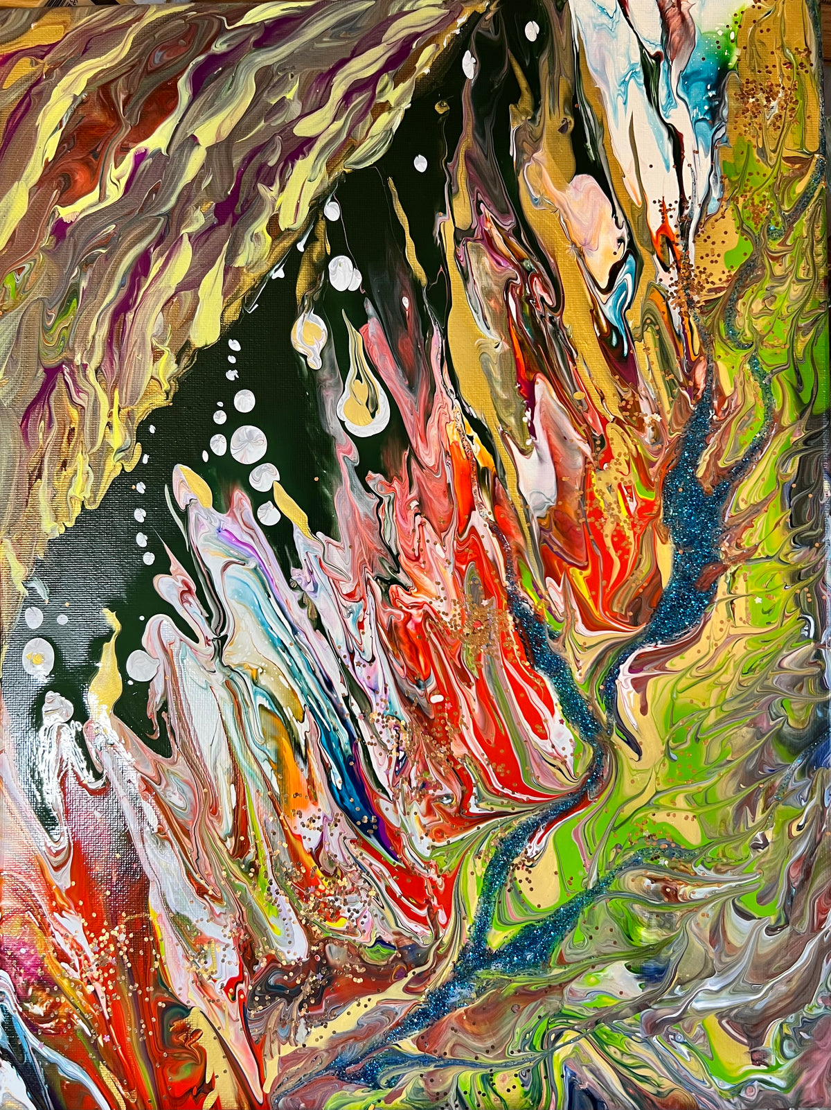 Abstract framed wall art print with vivid green, orange, red, and blue paint swirls and splashes