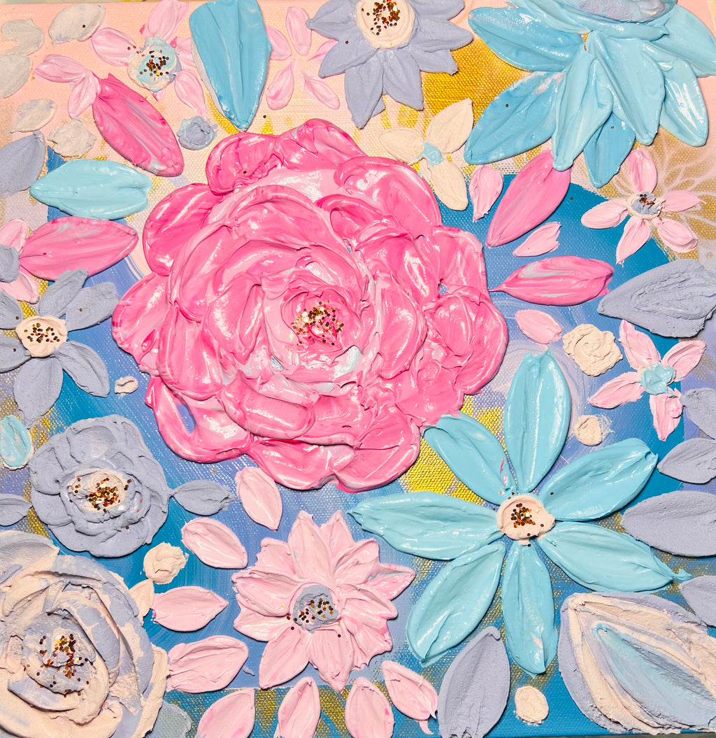 Framed floral wall art with thick pink and purple layered flowers on a blue background