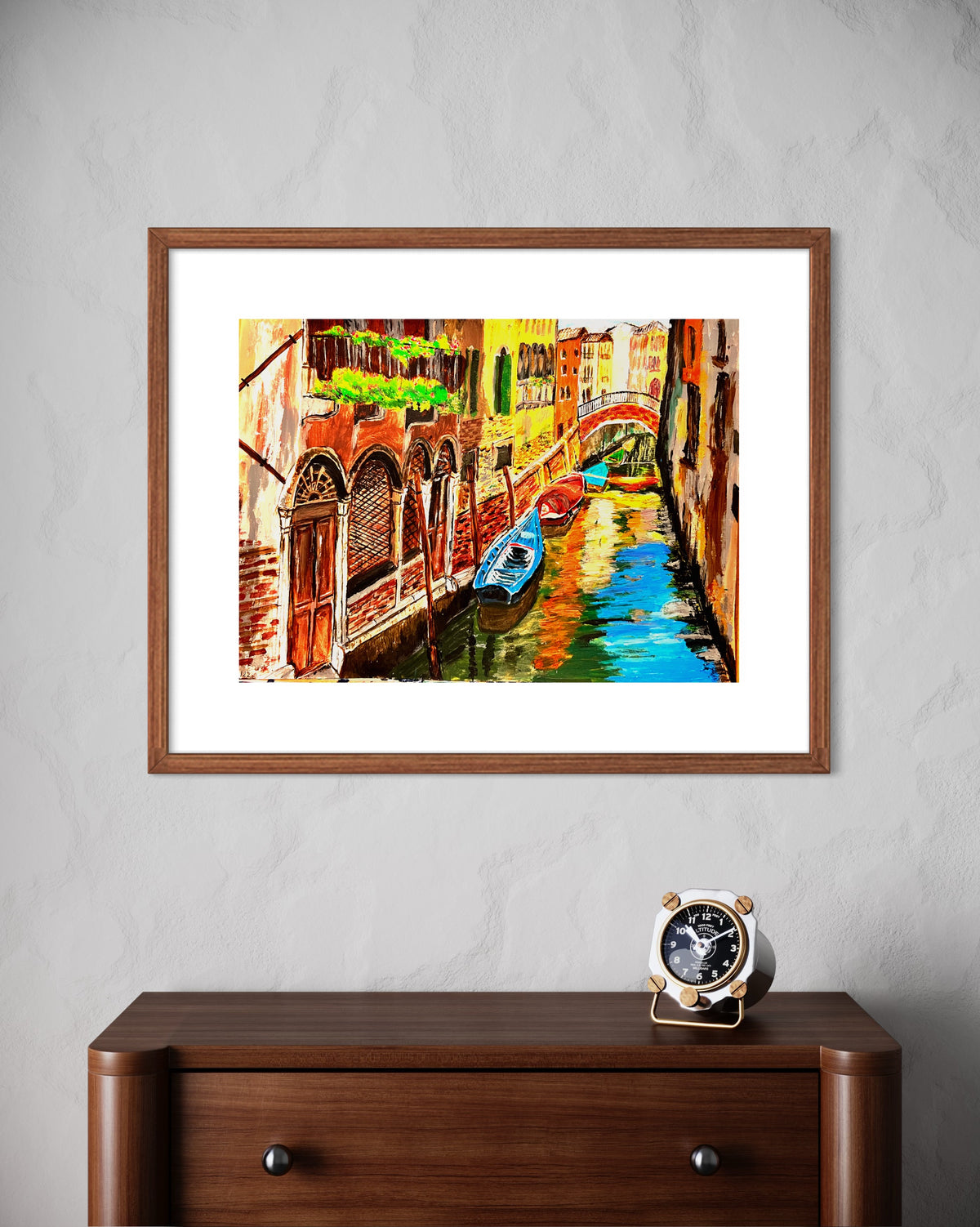 Brown-framed Venice canal art print with blue gondola and arched brick buildings
