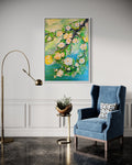Framed abstract floral painting in a gold-tone frame with green, blue, and yellow roses.