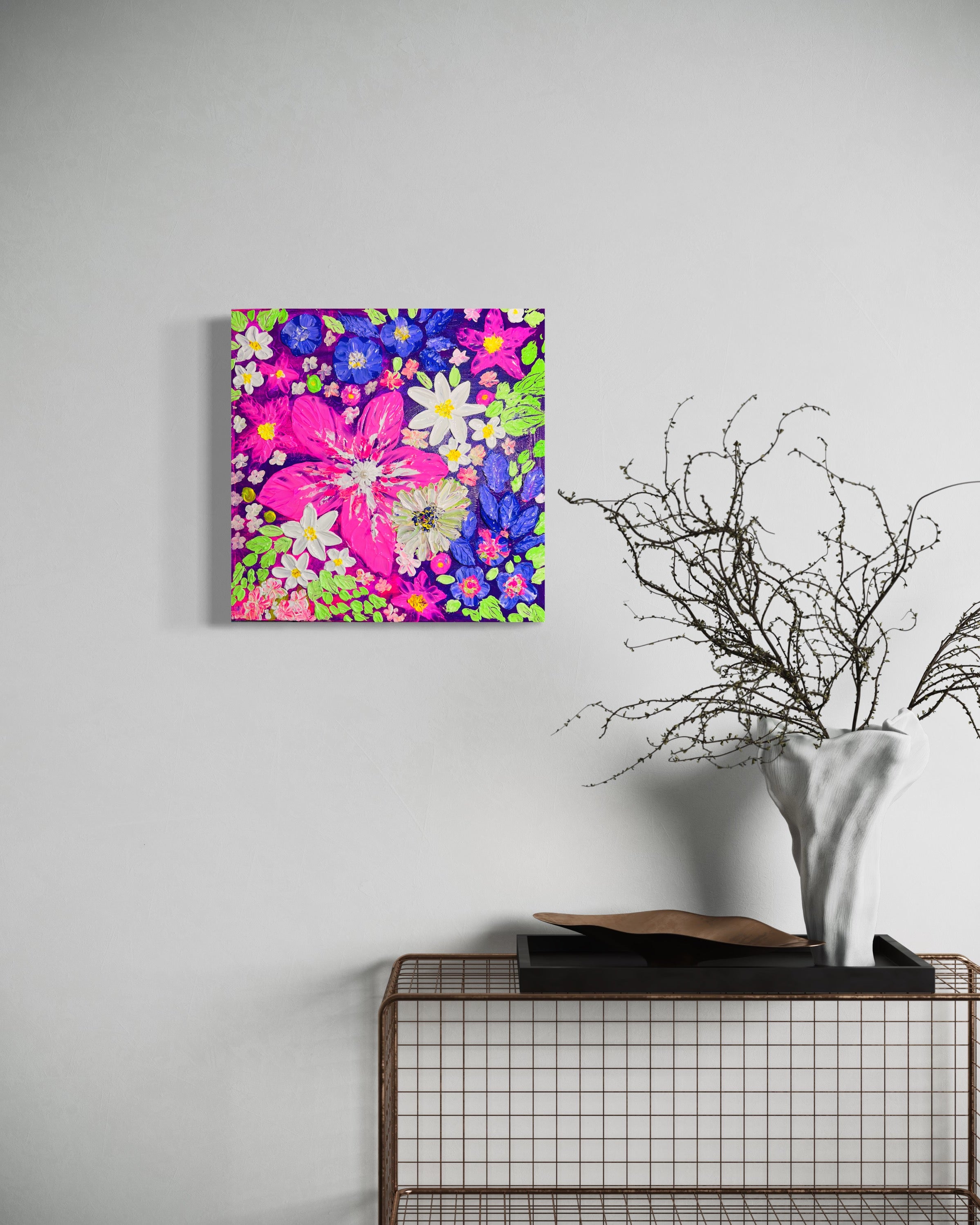 Framed thick texture floral wall art with white daisies and pink, blue, and green layered petals